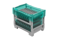 VCI-Seitenfaltenbeutel in grün in einer Metallbox